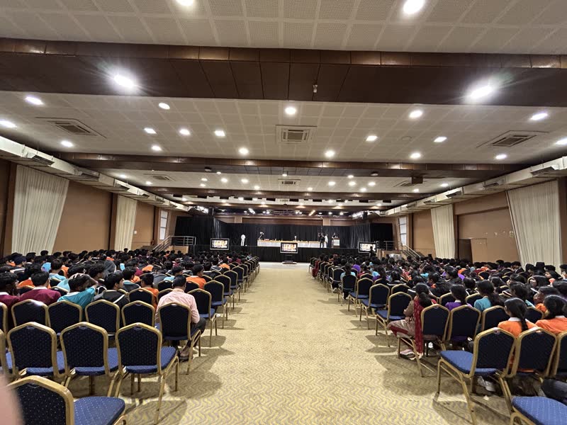 A full auditorium of students at a Manthan show